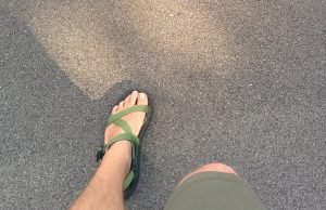 mans foot in sandal